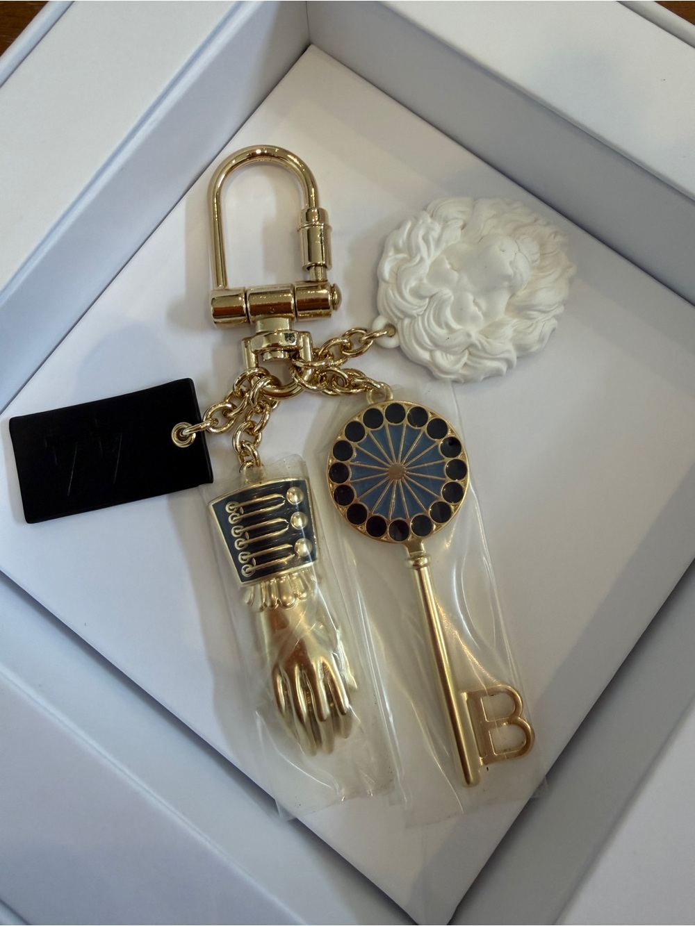 Balmain gold bag charm or keychain Brand New with box and dust bag